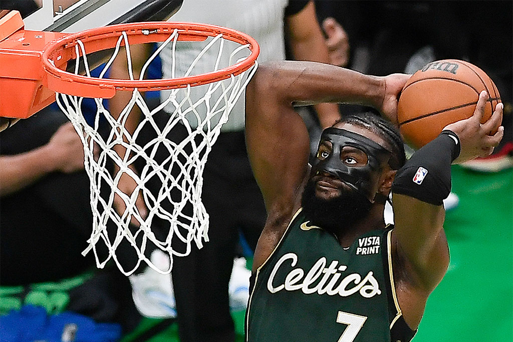 Apr 15, 2023; Boston, Massachusetts, USA; Boston Celtics guard Jaylen Brown (7) dunks against the Atlanta Hawks during the second quarter of game one of the 2023 NBA playoffs at TD Garden. Mandatory Credit: Eric Canha-USA TODAY Sports