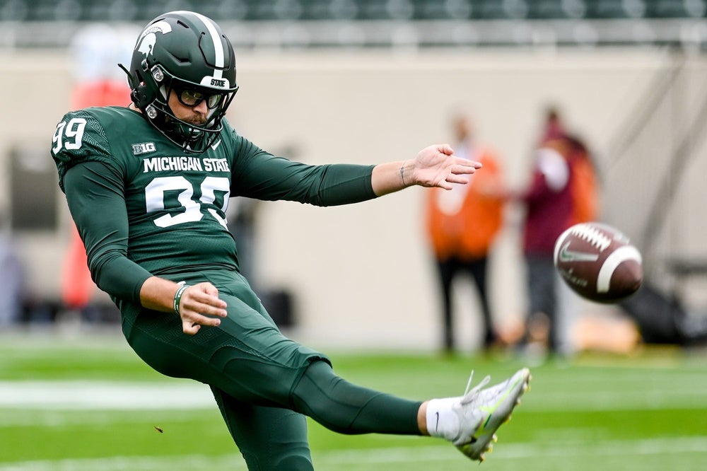 Michigan State's Bryce Baringer punts while warming up before the Spartans game against Minnesota during the first quarter on Saturday, Sept. 24, 2022, at Spartan Stadium in East Lansing. (Nick King/Lansing State Journal/USA Today Network)