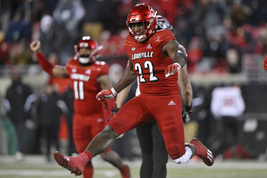 Nov 19, 2022; Louisville, Kentucky, USA;  Louisville Cardinals linebacker Yasir Abdullah (22) reacts during the second half against the North Carolina State Wolfpack at Cardinal Stadium. Louisville won 25-10. Credit: Jamie Rhodes-USA TODAY Sports