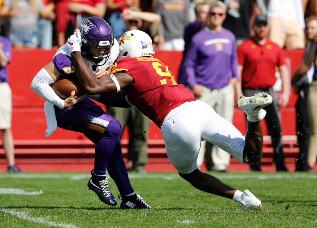 AMES, IA - SEPTEMBER 4: Defensive end Will McDonald IV #9 of the Iowa State Cyclones sacks quarterback Will McElvain #2 of the Northern Iowa Panthers as he scrambles for yards in the first half of play at Jack Trice Stadium on September 4, 2021 in Ames, Iowa. (Photo by David Purdy/Getty Images)