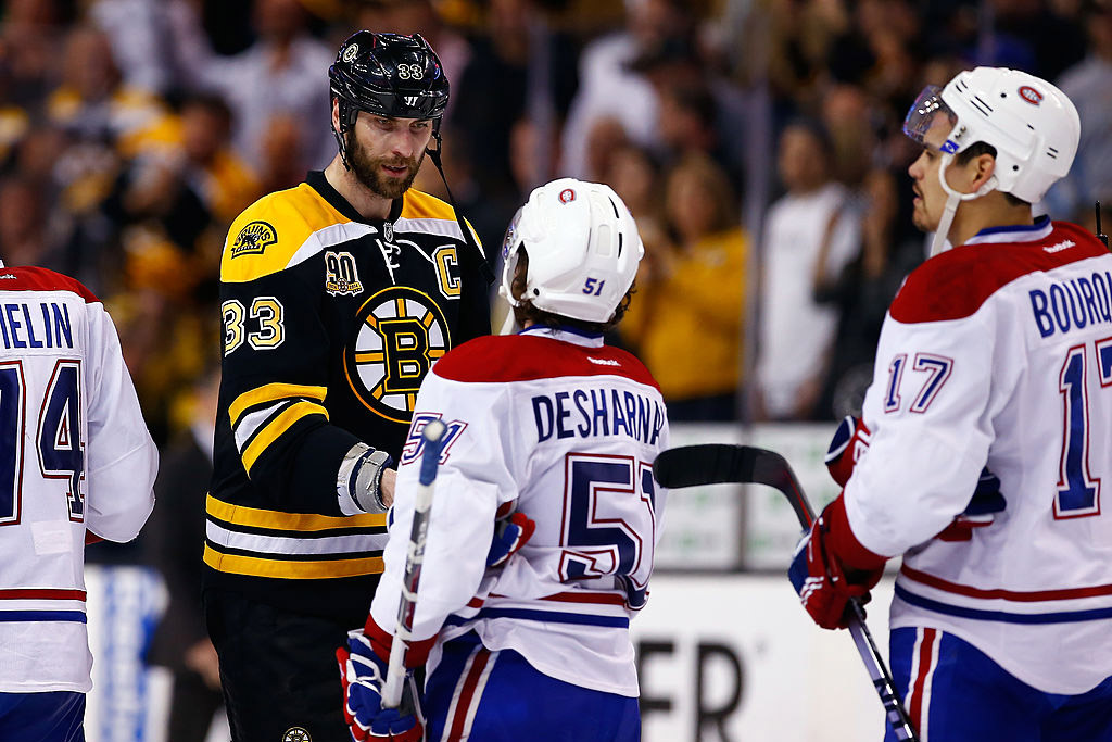 BOSTON, MA - MAY 14: Zdeno Chara #33 of the Boston Bruins shakes hands with David Desharnais #51 of the Montreal Canadiens after losing 3-1 in Game Seven of the Second Round of the 2014 NHL Stanley Cup Playoffs at the TD Garden on May 14, 2014 in Boston, Massachusetts. (Photo by Jared Wickerham/Getty Images)