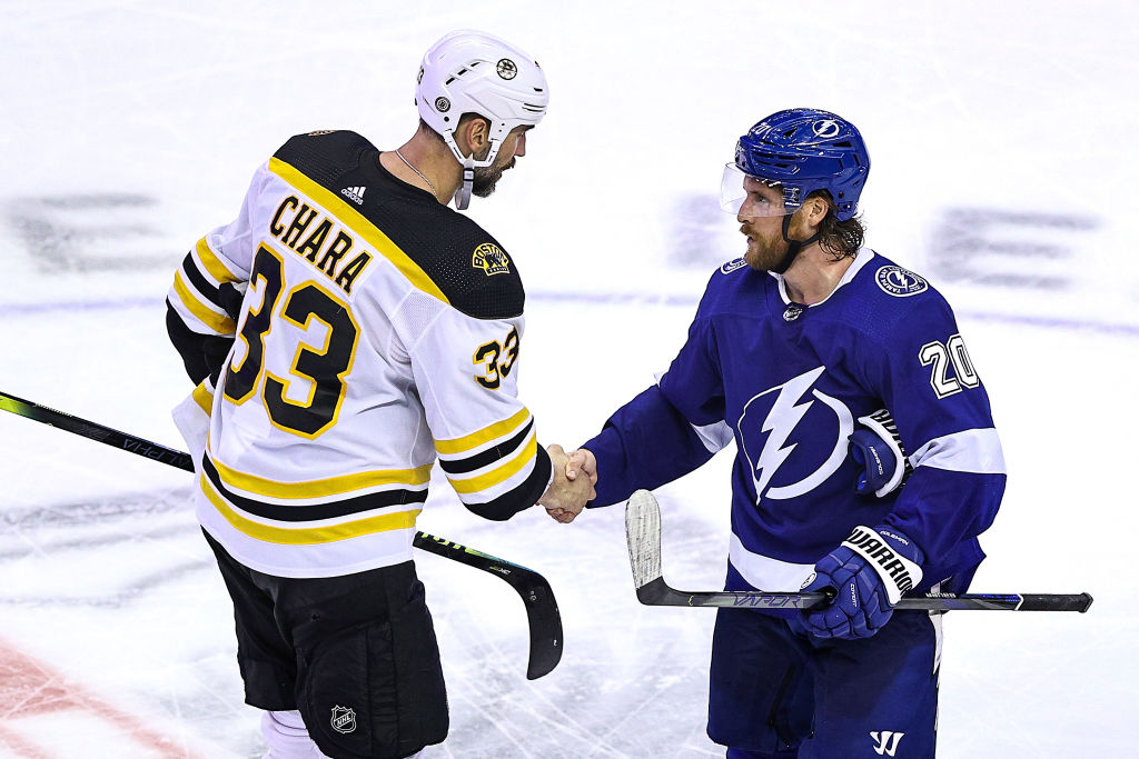 TORONTO, ONTARIO - AUGUST 31: Blake Coleman #20 of the Tampa Bay Lightning shakes hands with Zdeno Chara #33 of the Boston Bruins after the Lightning's 3-2 victory during the second overtime period in Game Five of the Eastern Conference Second Round during the 2020 NHL Stanley Cup Playoffs at Scotiabank Arena on August 31, 2020 in Toronto, Ontario. (Photo by Elsa/Getty Images)