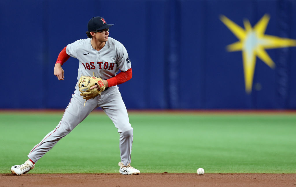 ST PETERSBURG, FLORIDA - APRIL 12: Bobby Dalbec #29 of the Boston Red Sox makes an error in the first inning during a game against the Tampa Bay Rays at Tropicana Field on April 12, 2023 in St Petersburg, Florida. (Photo by Mike Ehrmann/Getty Images)