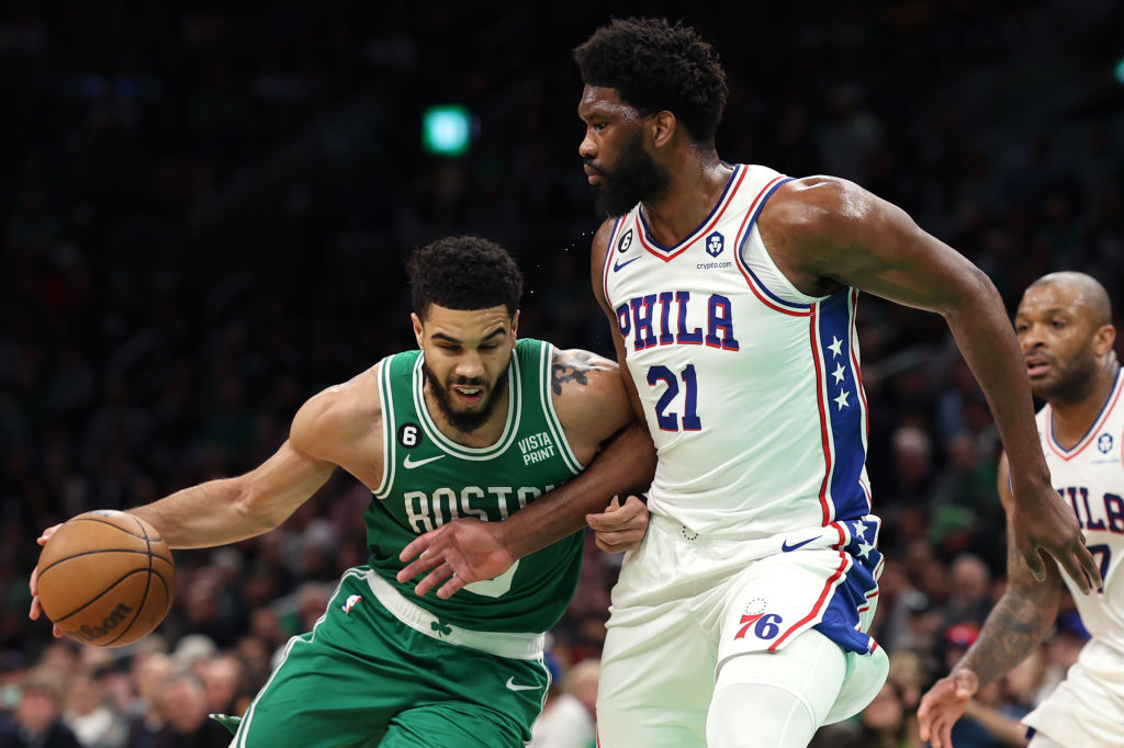 BOSTON, MASSACHUSETTS - MAY 03: Jayson Tatum #0 of the Boston Celtics drives to the basket against Joel Embiid #21 of the Philadelphia 76ers during the first quarter of game two of the Eastern Conference Second Round Playoffs at TD Garden on May 03, 2023 in Boston, Massachusetts. (Photo by Maddie Meyer/Getty Images)