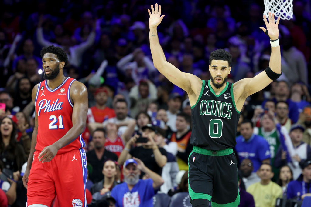 PHILADELPHIA, PENNSYLVANIA - MAY 05: Jayson Tatum #0 of the Boston Celtics reacts against Joel Embiid #21 of the Philadelphia 76ers during the fourth quarter in game three of the Eastern Conference Second Round Playoffs at Wells Fargo Center on May 05, 2023 in Philadelphia, Pennsylvania. (Photo by Tim Nwachukwu/Getty Images)