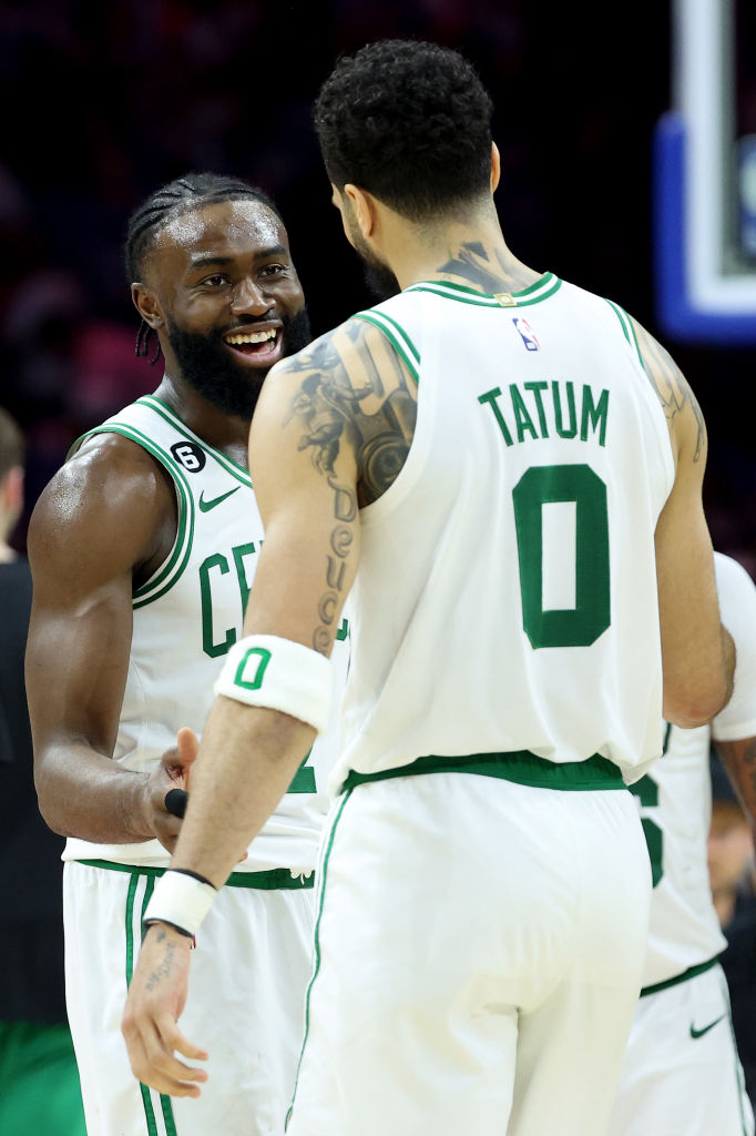 PHILADELPHIA, PENNSYLVANIA - MAY 11: Jayson Tatum #0 and Jaylen Brown #7 of the Boston Celtics celebrate a play against the Philadelphia 76ers in game six of the Eastern Conference Semifinals in the 2023 NBA Playoffs at Wells Fargo Center on May 11, 2023 in Philadelphia, Pennsylvania. NOTE TO USER: User expressly acknowledges and agrees that, by downloading and or using this photograph, User is consenting to the terms and conditions of the Getty Images License Agreement. (Photo by Tim Nwachukwu/Getty Images)