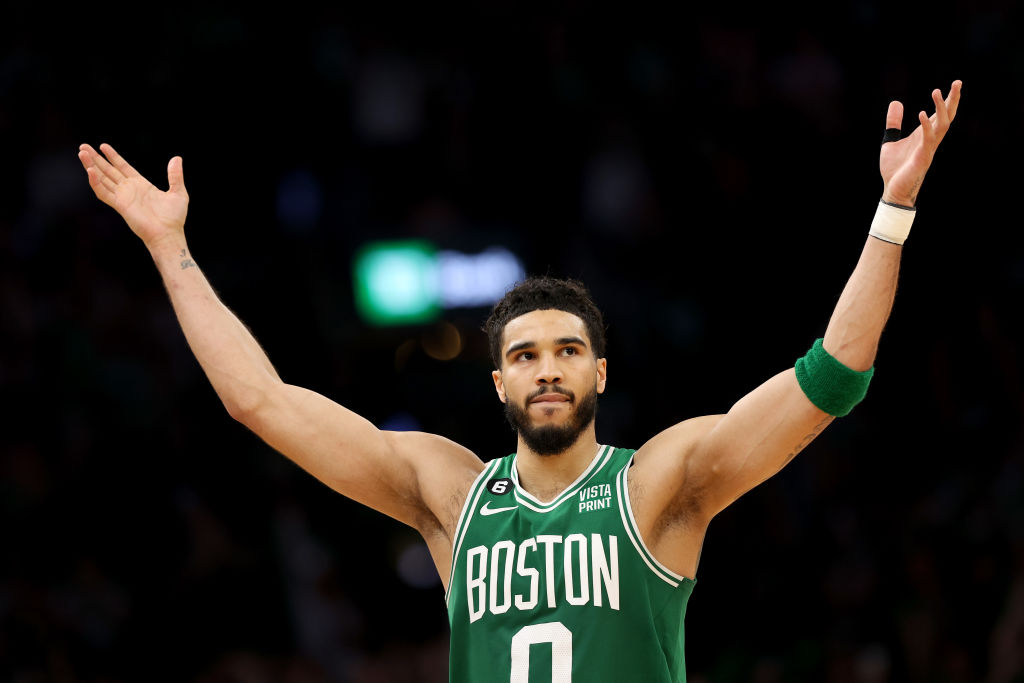 BOSTON, MASSACHUSETTS - MAY 14: Jayson Tatum #0 of the Boston Celtics celebrates as he is taken out against the Philadelphia 76ers during the fourth quarter in game seven of the 2023 NBA Playoffs Eastern Conference Semifinals at TD Garden on May 14, 2023 in Boston, Massachusetts. (Photo by Adam Glanzman/Getty Images)