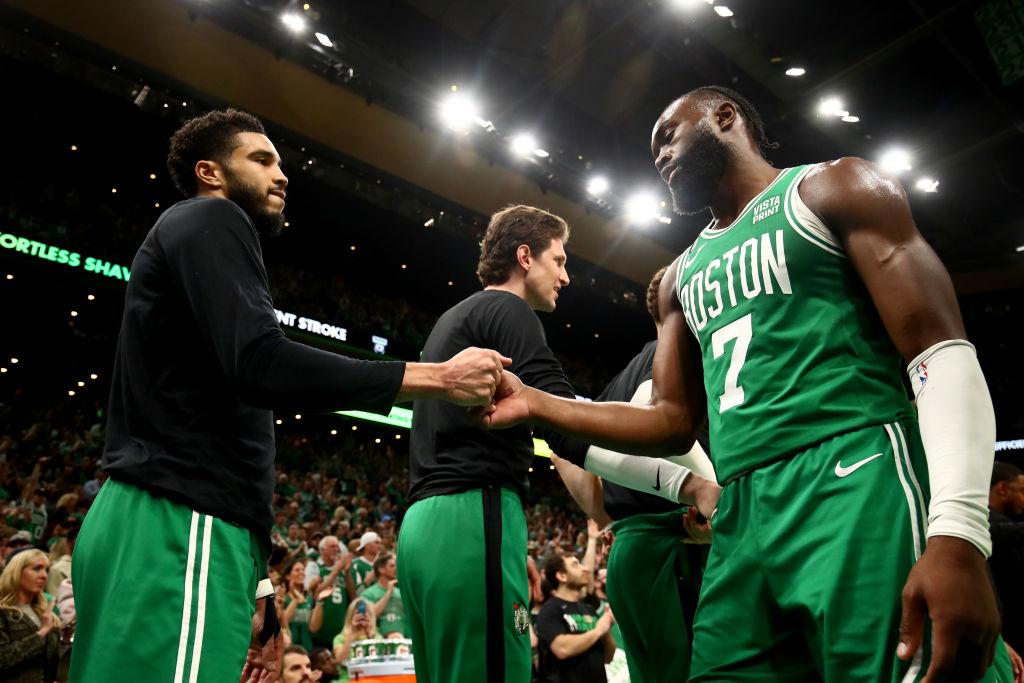 BOSTON, MASSACHUSETTS - MAY 14: (L-R) Jayson Tatum #0 and Jaylen Brown #7 of the Boston Celtics celebrate after defeating the Philadelphia 76ers in game seven to win the 2023 NBA Playoffs Eastern Conference Semifinals at TD Garden on May 14, 2023 in Boston, Massachusetts. NOTE TO USER: User expressly acknowledges and agrees that, by downloading and or using this photograph, User is consenting to the terms and conditions of the Getty Images License Agreement. (Photo by Adam Glanzman/Getty Images)