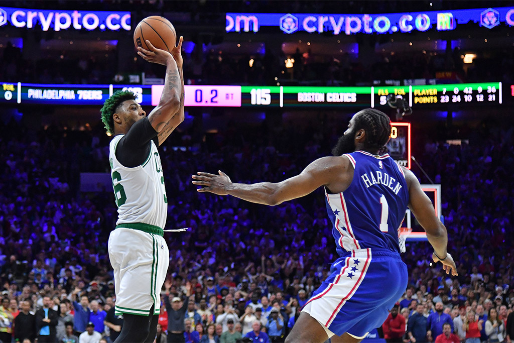 May 7, 2023; Philadelphia, Pennsylvania, USA; Boston Celtics guard Marcus Smart (36) shoots a three point basket as time expired over Philadelphia 76ers guard James Harden (1) in overtime during game four of the 2023 NBA playoffs at Wells Fargo Center. Mandatory Credit: Eric Hartline-USA TODAY Sports