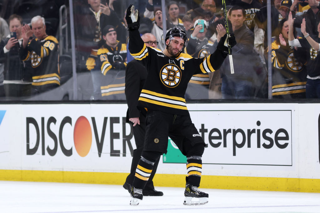 BOSTON, MASSACHUSETTS - APRIL 30: Patrice Bergeron #37 of the Boston Bruins waves to fans before exiting the ice after Florida Panthers defeat the Bruins 4-3 in overtime of Game Seven of the First Round of the 2023 Stanley Cup Playoffs at TD Garden on April 30, 2023 in Boston, Massachusetts. (Photo by Maddie Meyer/Getty Images)