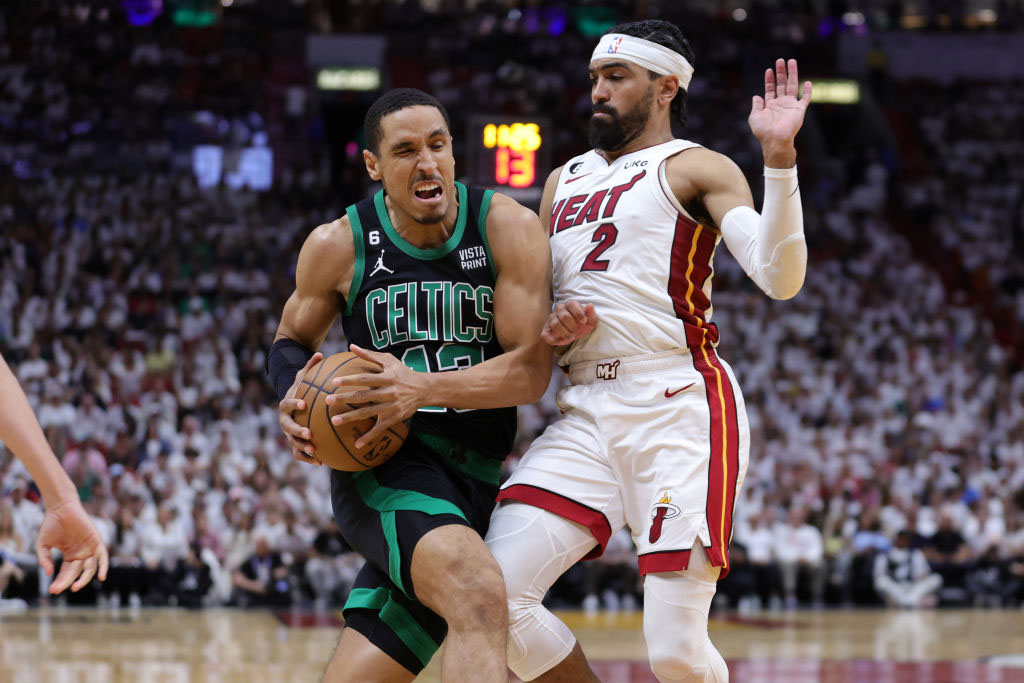Malcolm Brogdon of the Boston Celtics drives against Gabe Vincent of the Miami Heat during Game 3 of the 2023 Eastern Conference Finals. (Photo by Megan Briggs/Getty Images)