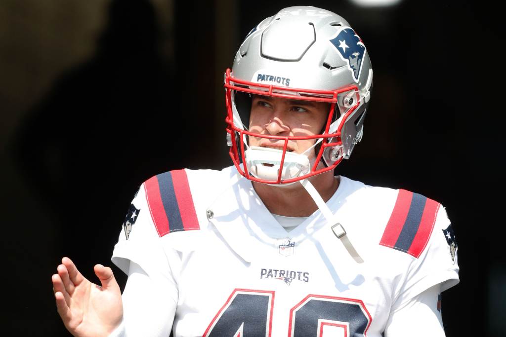 Sep 18, 2022; Pittsburgh, Pennsylvania, USA; New England Patriots long snapper Joe Cardona (49) takes the field to warm up before the game against the Pittsburgh Steelers at Acrisure Stadium. Credit: Charles LeClaire-USA TODAY Sports