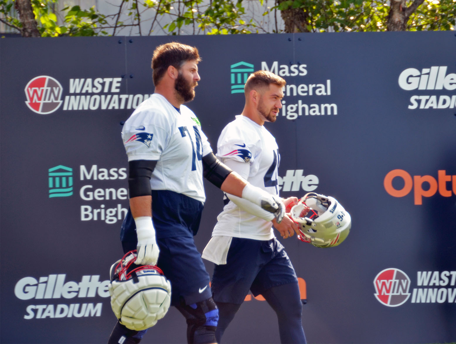New England Patriots tackle Riley Reiff (74) walks onto the field for practice at 2023 training camp in Foxboro. (Katie Bennert/98.5 The Sports Hub)