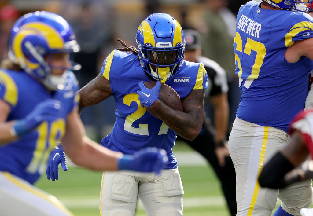 INGLEWOOD, CALIFORNIA - NOVEMBER 13: Darrell Henderson Jr. #27 of the Los Angeles Rams carries the ball during a 27-17 loss to the Arizona Cardinals at SoFi Stadium on November 13, 2022 in Inglewood, California. (Photo by Harry How/Getty Images)