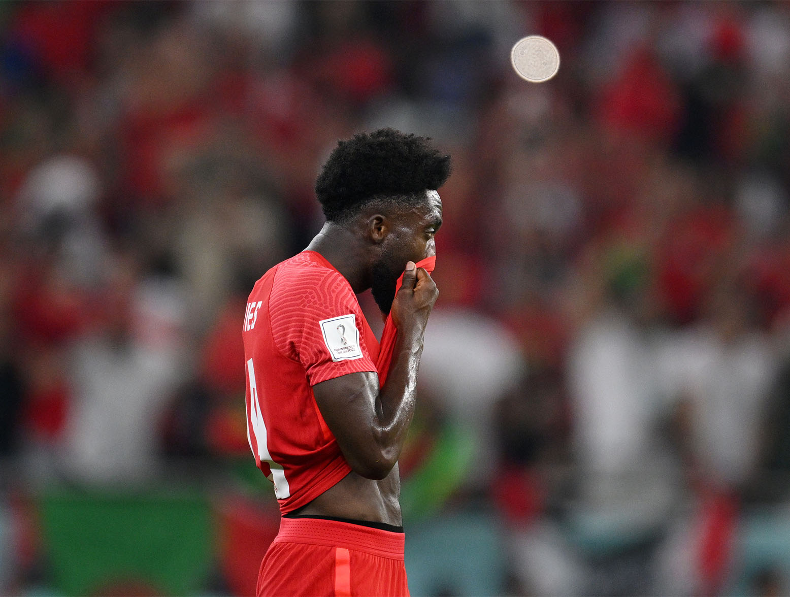 DOHA, QATAR - DECEMBER 01: Mark-Anthony Kaye of Canada shows dejection after the 1-2 victory in the FIFA World Cup Qatar 2022 Group F match between Canada and Morocco at Al Thumama Stadium on December 01, 2022 in Doha, Qatar. (Photo by Matthias Hangst/Getty Images)