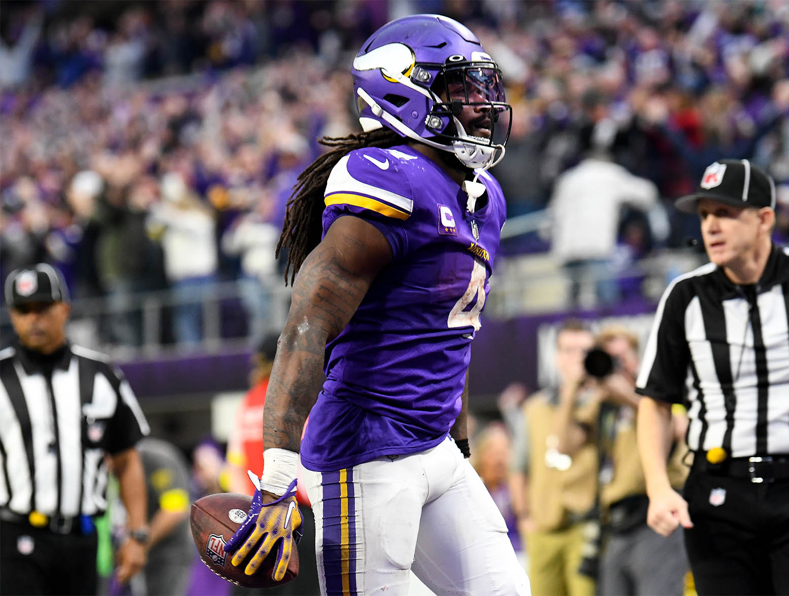 MINNEAPOLIS, MINNESOTA - DECEMBER 17: Dalvin Cook #4 of the Minnesota Vikings celebrates after rushing for a touchdown against the Indianapolis Colts during the fourth quarter of the game at U.S. Bank Stadium on December 17, 2022 in Minneapolis, Minnesota. (Photo by Stephen Maturen/Getty Images)