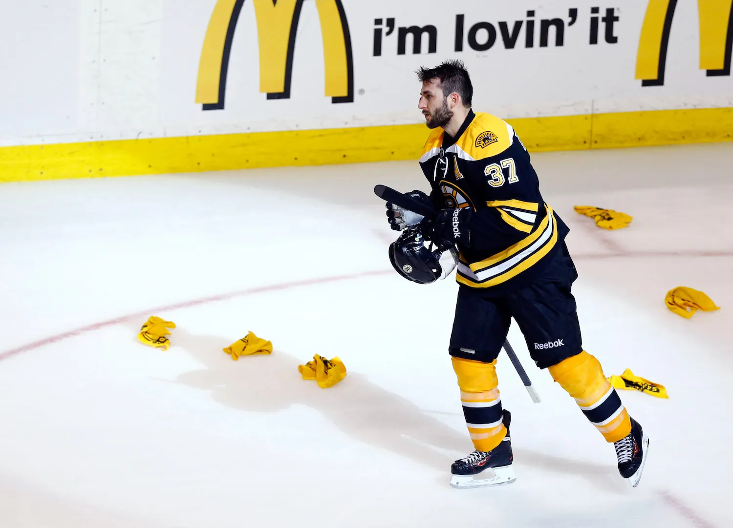 Boston Bruins - Patrice Bergeron walks down the street into Fenway