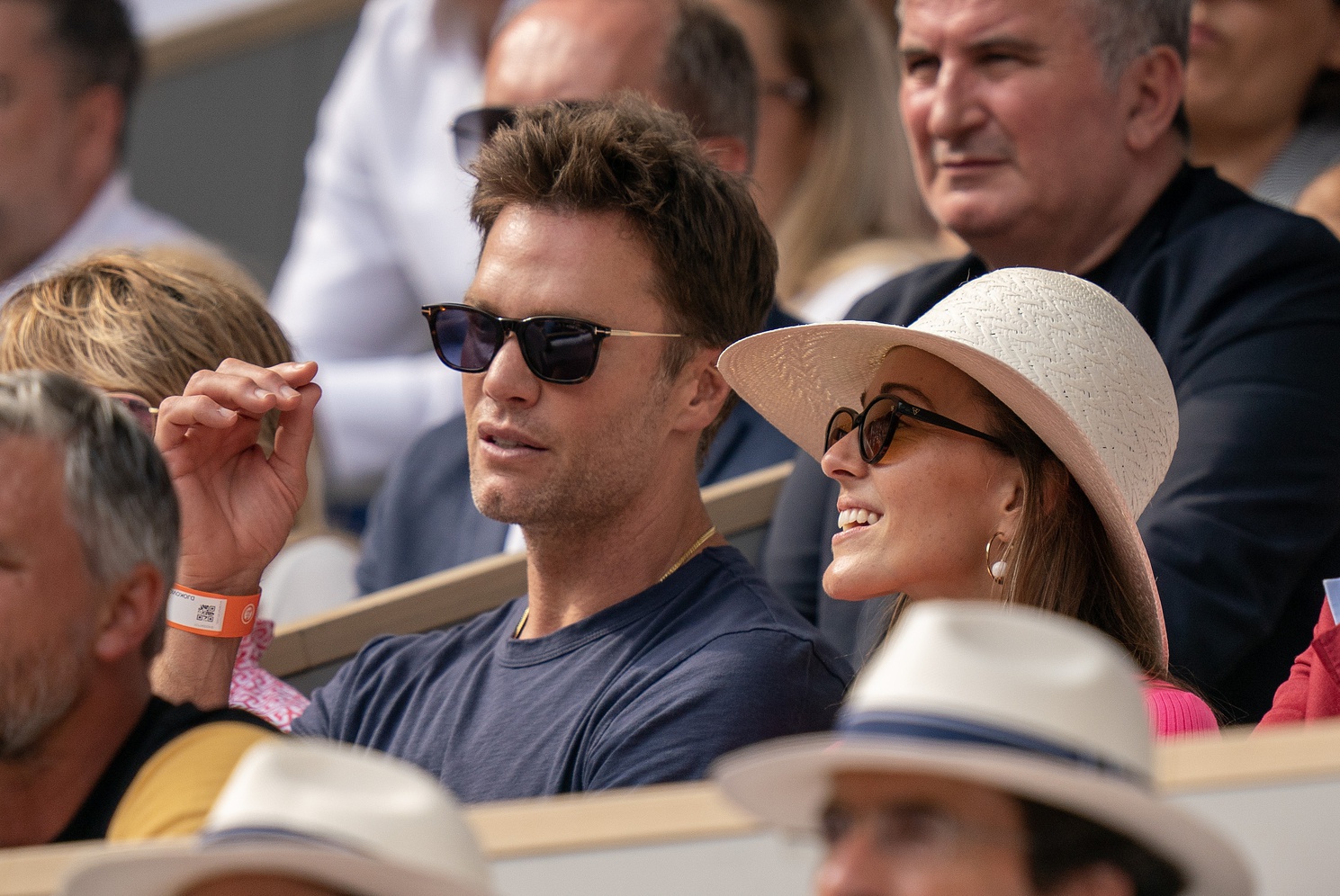 Tom Brady at the French Open watching Novak Djokovic.