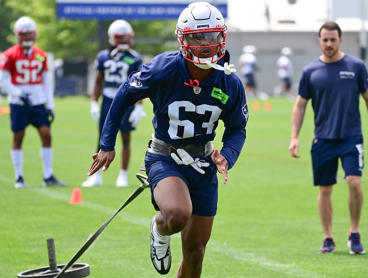 Jun 12, 2023; Foxborough, MA, USA; New England Patriots cornerback Isaiah Bolden (63) pulls a sled at the Patriots minicamp at Gillette Stadium. Mandatory Credit: Eric Canha-USA TODAY Sports