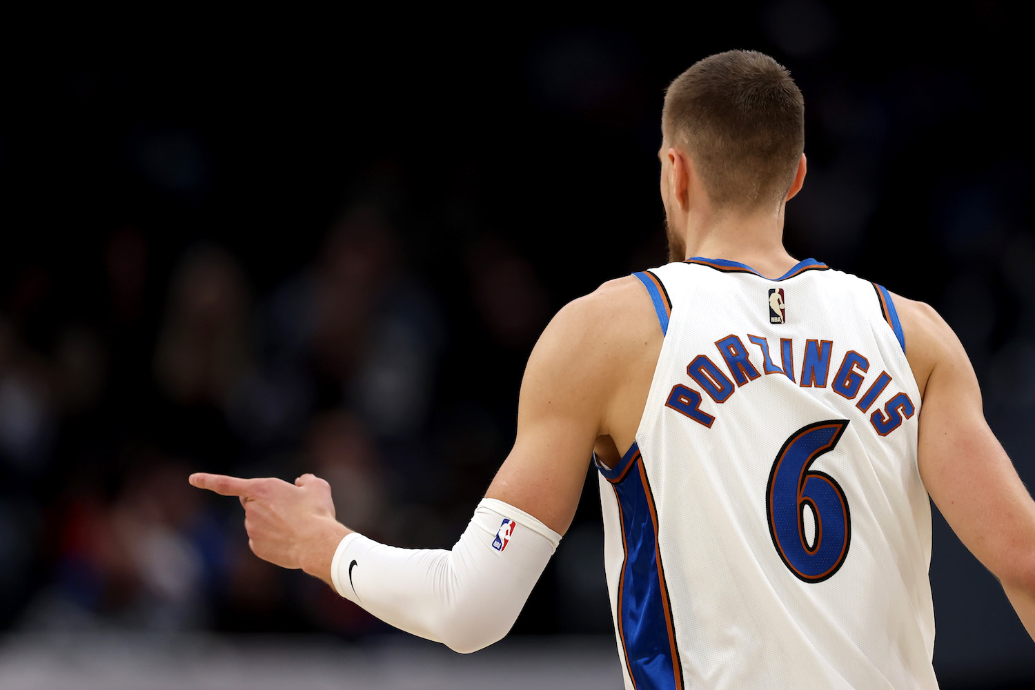 WASHINGTON, DC - NOVEMBER 28: Kristaps Porzingis #6 of the Washington Wizards celebrates against the Minnesota Timberwolves at Capital One Arena on November 28, 2022 in Washington, DC. NOTE TO USER: User expressly acknowledges and agrees that, by downloading and or using this photograph, User is consenting to the terms and conditions of the Getty Images License Agreement. (Photo by Rob Carr/Getty Images)