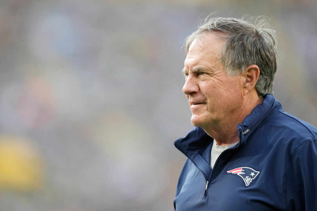 GREEN BAY, WISCONSIN - AUGUST 19: Head coach Bill Belichick of the New England Patriots looks on before a preseason game against the Green Bay Packers at Lambeau Field on August 19, 2023 in Green Bay, Wisconsin. (Photo by Patrick McDermott/Getty Images)