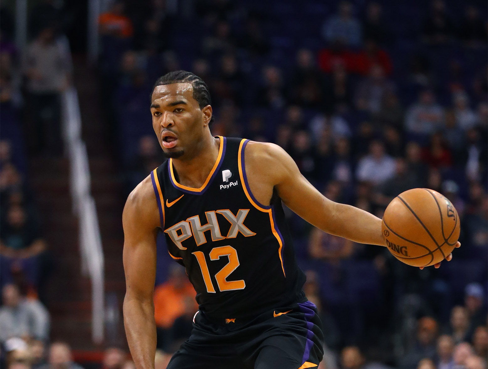 Dec 15, 2018; Phoenix, AZ, USA; Phoenix Suns forward TJ Warren (12) against the Minnesota Timberwolves at Talking Stick Resort Arena. Mandatory Credit: Mark J. Rebilas-USA TODAY Sports