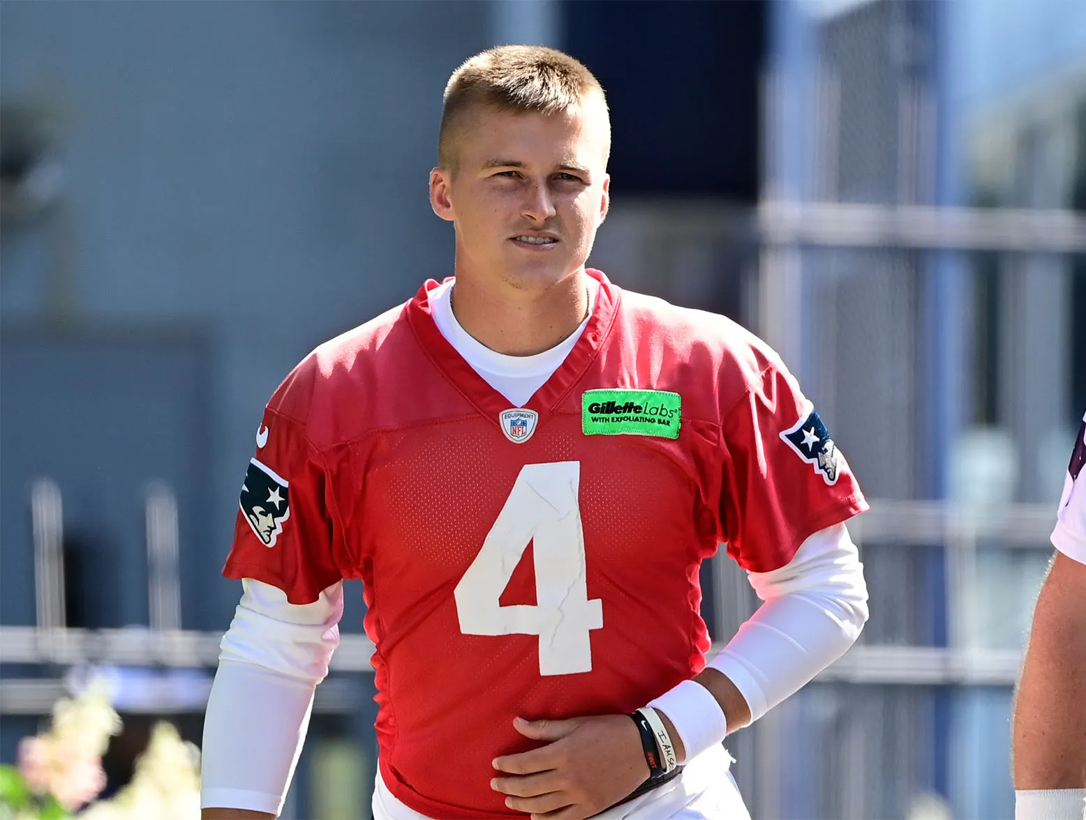 New England Patriots quarterback Bailey Zappe performs field