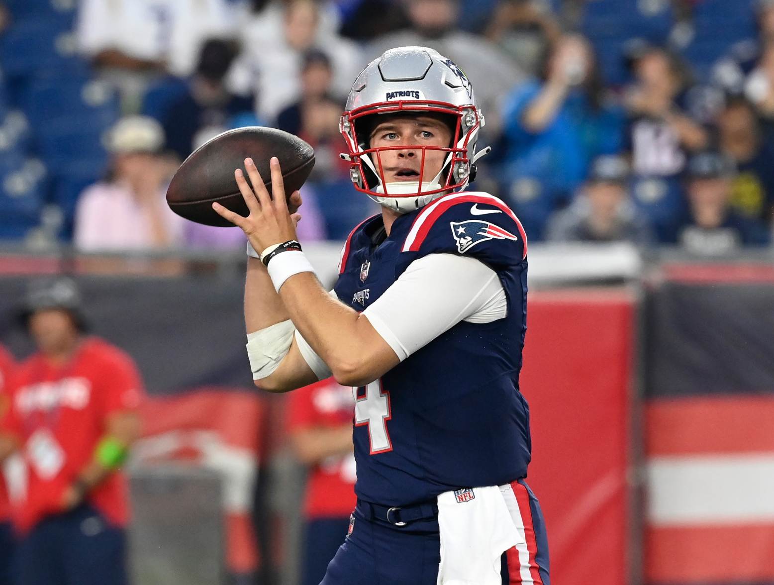 Aug 10, 2023; Foxborough, Massachusetts, USA; New England Patriots quarterback Bailey Zappe (4) looks to make a pass during the first half against the Houston Texans at Gillette Stadium. Credit: Eric Canha-USA TODAY Sports
