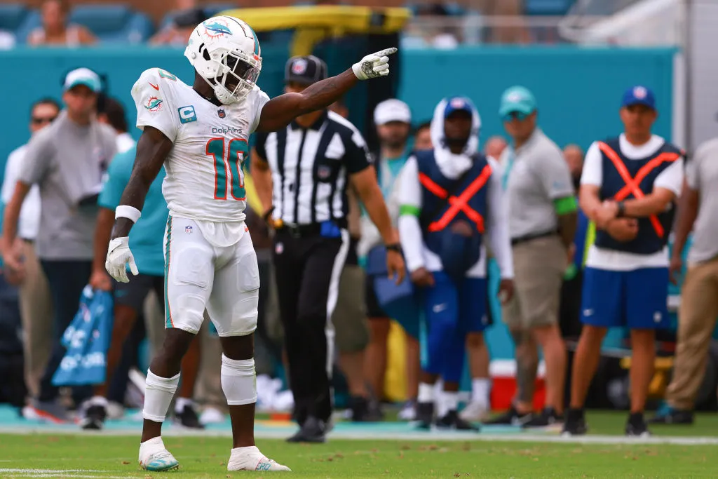 MIAMI GARDENS, FLORIDA - SEPTEMBER 24: Tyreek Hill #10 of the Miami Dolphins react after a first down during the third quarter against the Denver Broncos at Hard Rock Stadium on September 24, 2023 in Miami Gardens, Florida. (Photo by Megan Briggs/Getty Images)
