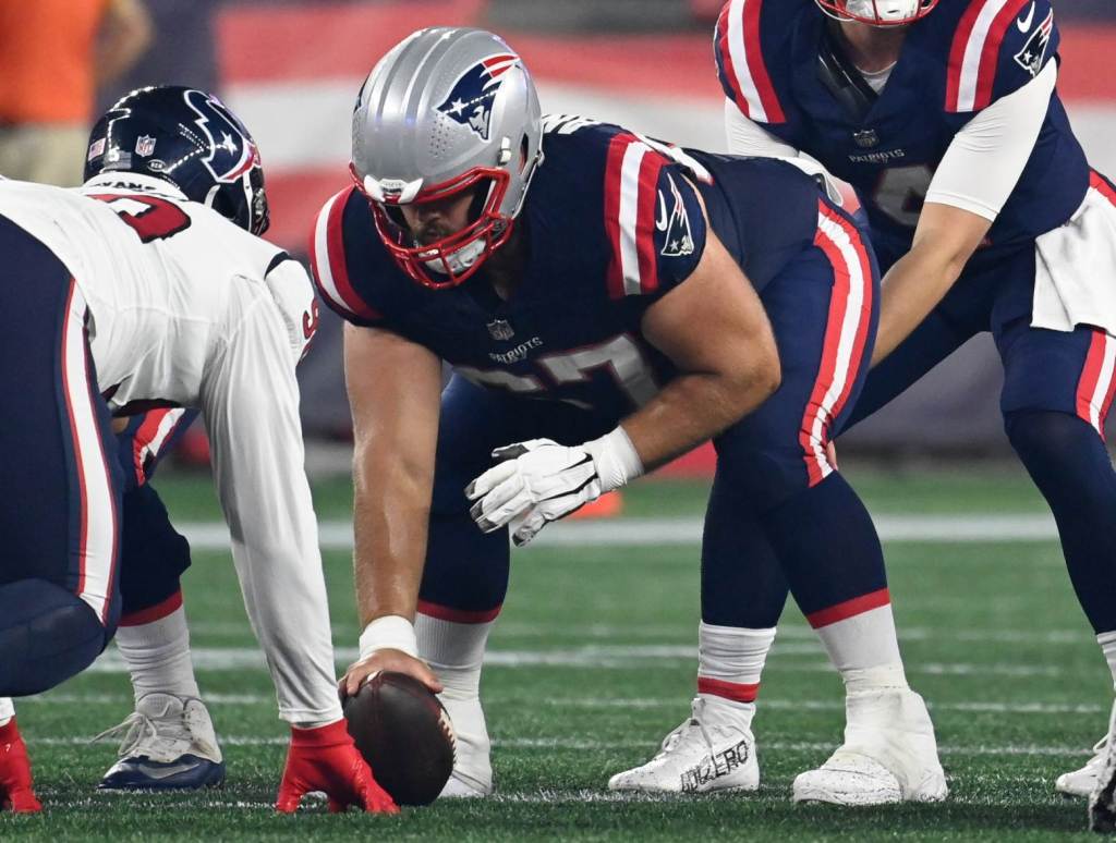 Aug 10, 2023; Foxborough, Massachusetts, USA; New England Patriots quarterback Bailey Zappe (4) calls for the snap from center Jake Andrews (67) during the second half against the Houston Texans at Gillette Stadium. Credit: Eric Canha-USA TODAY Sports