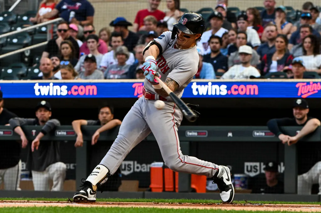 MINNEAPOLIS, MINNESOTA - JUNE 19: Jarren Duran #16 of the Boston Red Sox hits a double in the first inning against the Minnesota Twins at Target Field on June 19, 2023 in Minneapolis, Minnesota. (Photo by Stephen Maturen/Getty Images)