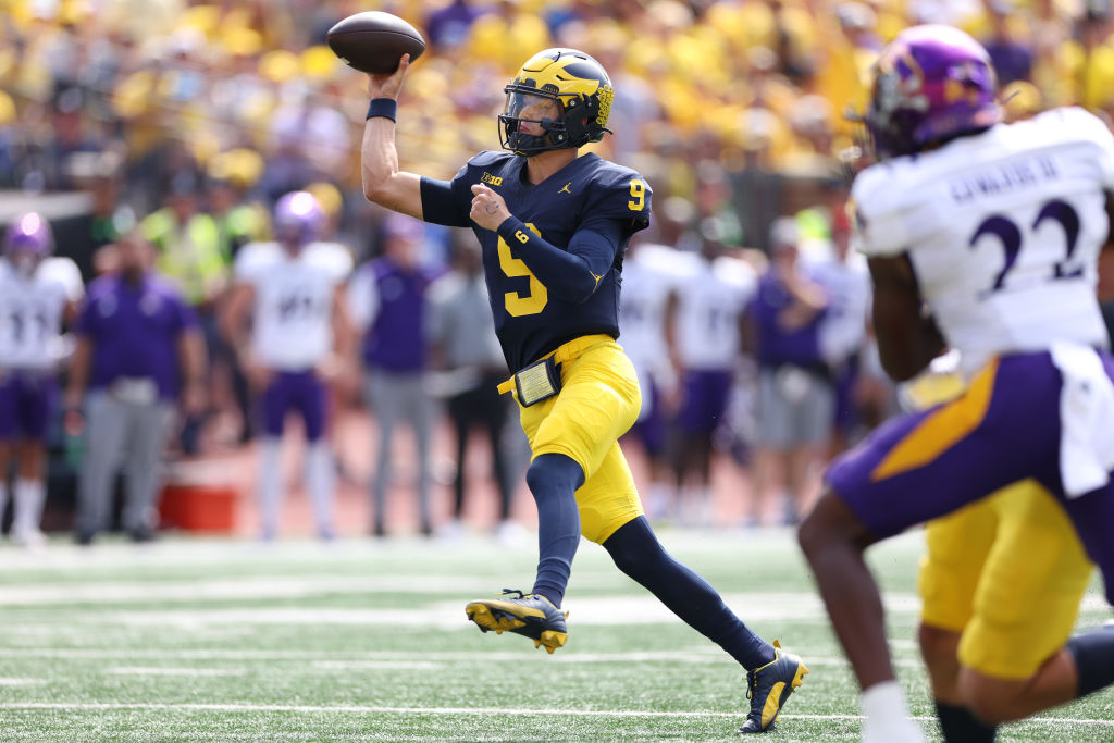 ANN ARBOR, MICHIGAN - SEPTEMBER 02: J.J. McCarthy #9 of the Michigan Wolverines throws a first quarter touchdown while playing the East Carolina Pirates at Michigan Stadium on September 02, 2023 in Ann Arbor, Michigan. (Photo by Gregory Shamus/Getty Images)
