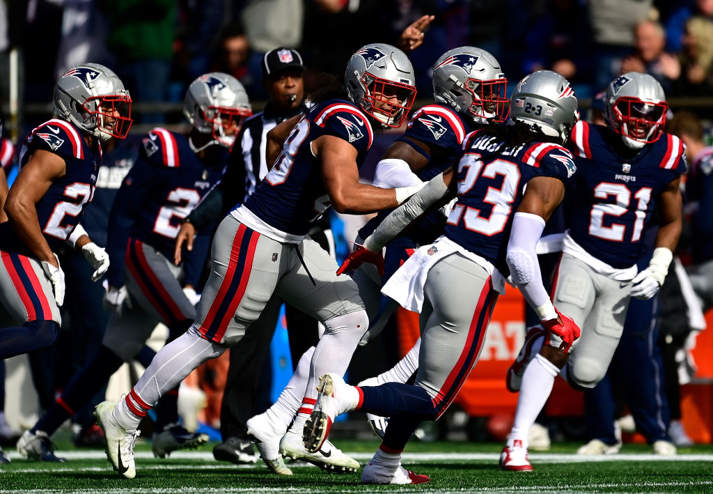 FOXBOROUGH, MASSACHUSETTS - OCTOBER 22: Jabrill Peppers #5 of the New England Patriots celebrates with teammates after intercepting the ball in the first quarter of the game against the Buffalo Bills at Gillette Stadium on October 22, 2023 in Foxborough, Massachusetts. (Photo by Billie Weiss/Getty Images)