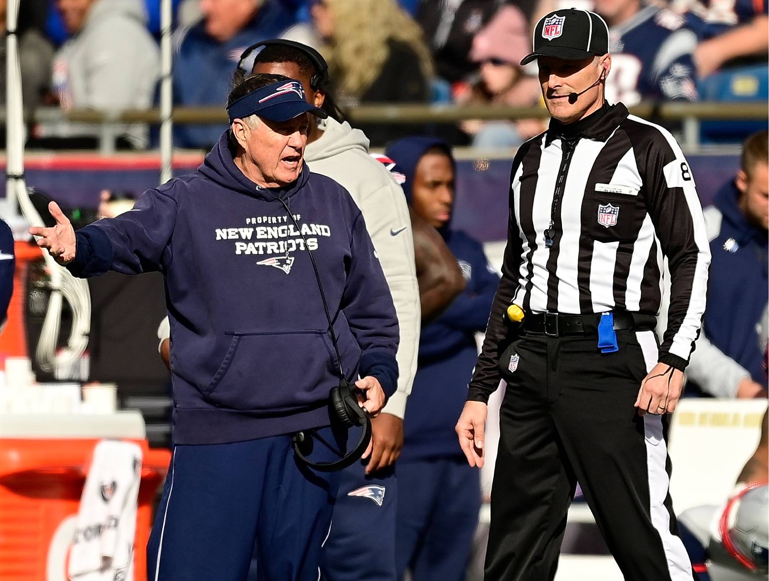 FOXBOROUGH, MASSACHUSETTS - OCTOBER 22: Head coach Bill Belichick of the New England Patriots speaks with a referee in the third quarter of the game against the Buffalo Bills at Gillette Stadium on October 22, 2023 in Foxborough, Massachusetts. (Photo by Billie Weiss/Getty Images)