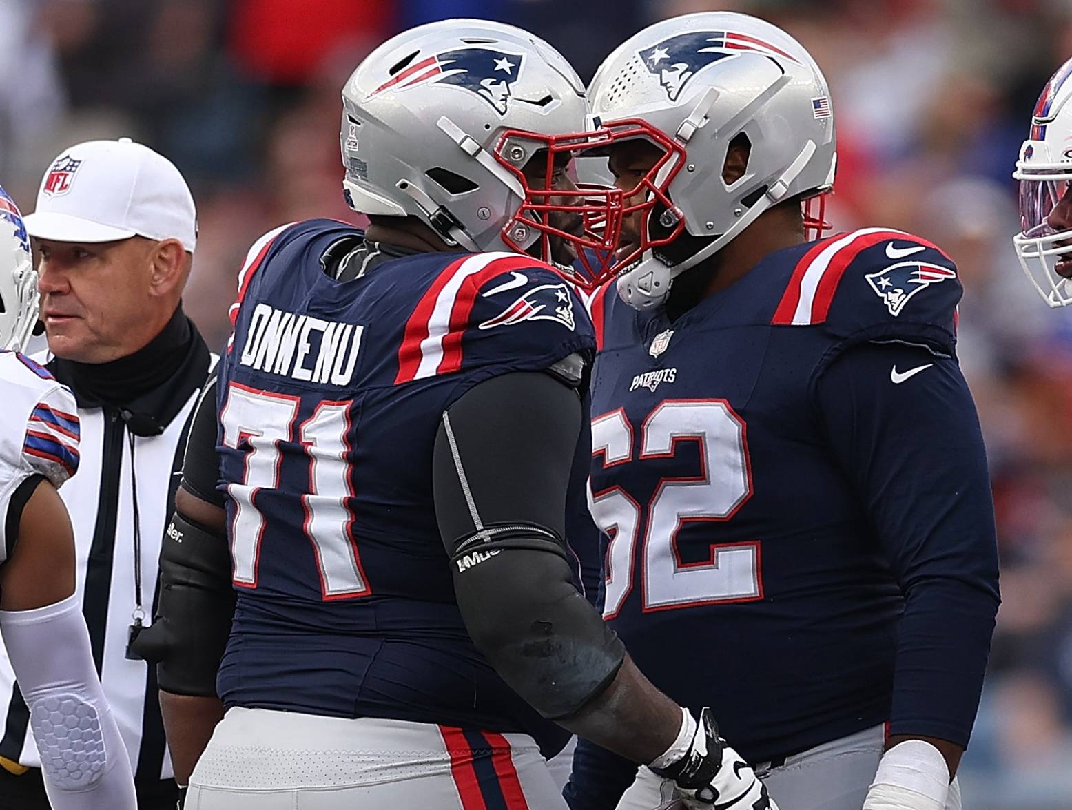 FOXBOROUGH, MASSACHUSETTS - OCTOBER 22: Patriots' offensive linemen Mike Onwenu and Sidy Sow during the fourth quarter of the game against the Buffalo Bills at Gillette Stadium on October 22, 2023 in Foxborough, Massachusetts. (Photo by Maddie Meyer/Getty Images)
