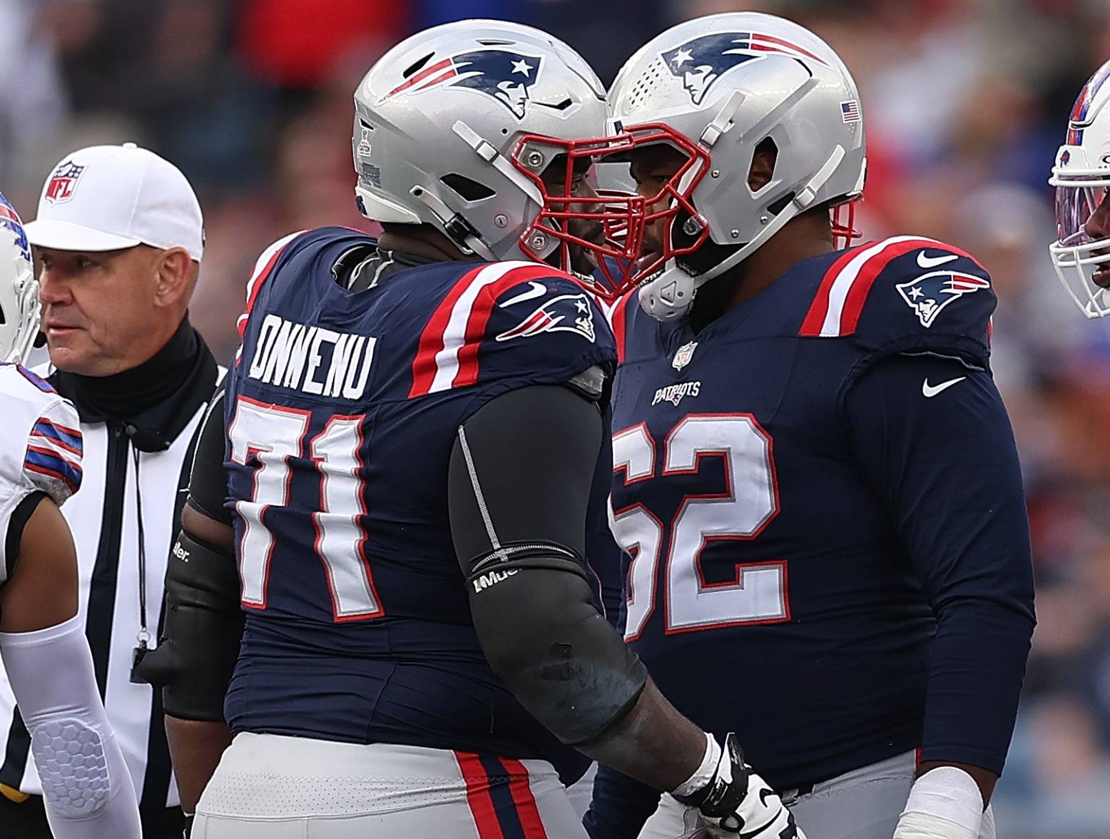 FOXBOROUGH, MASSACHUSETTS - OCTOBER 22: Mac Jones #10 of the New England Patriots kneels after being sacked in the fourth quarter of the game against the Buffalo Bills at Gillette Stadium on October 22, 2023 in Foxborough, Massachusetts. (Photo by Maddie Meyer/Getty Images)