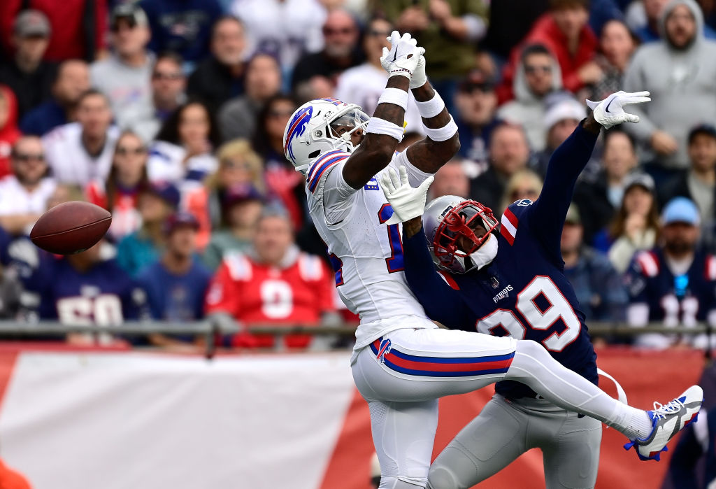 FOXBOROUGH, MASSACHUSETTS - OCTOBER 22: J.C. Jackson #29 of the New England Patriots breaks up a pass intended for Stefon Diggs #14 of the Buffalo Bills in the fourth quarter of the game at Gillette Stadium on October 22, 2023 in Foxborough, Massachusetts. (Photo by Billie Weiss/Getty Images)