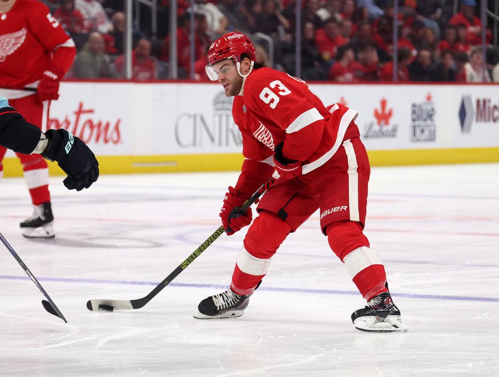 DETROIT, MICHIGAN - OCTOBER 24: Alex DeBrincat #93 of the Detroit Red Wings skates against the Seattle Kraken at Little Caesars Arena on October 24, 2023 in Detroit, Michigan. (Photo by Gregory Shamus/Getty Images)