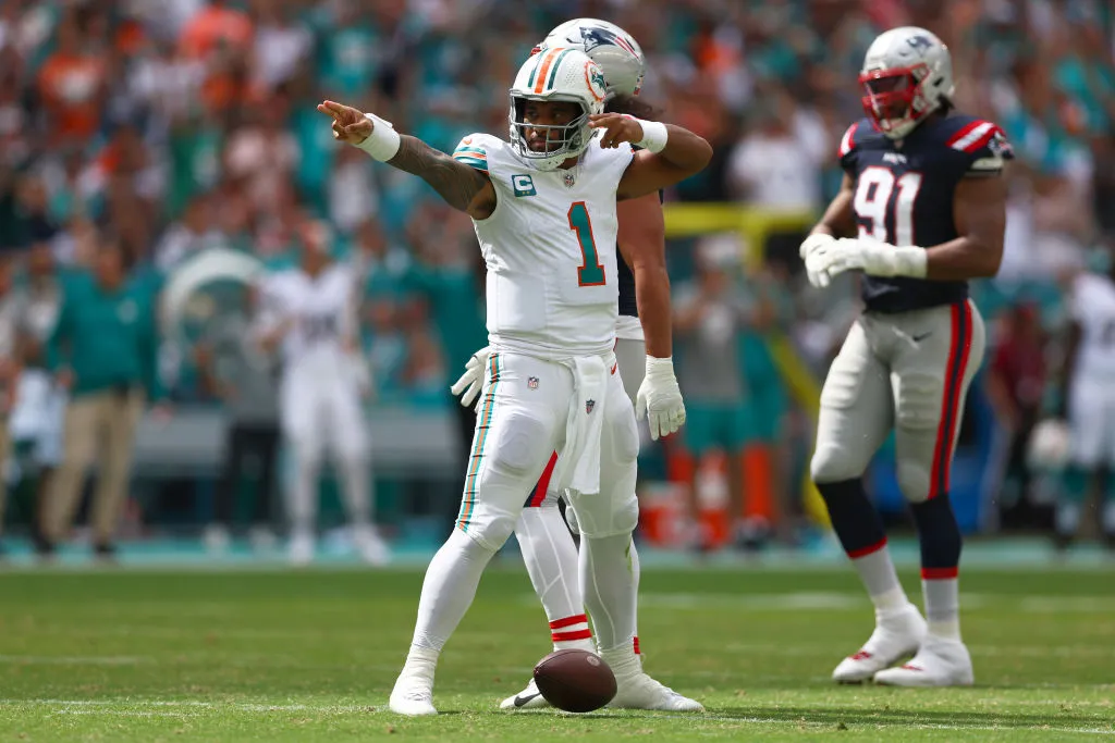 MIAMI GARDENS, FLORIDA - OCTOBER 29: Tua Tagovailoa #1 of the Miami Dolphins signals for a first down during the second quarter against the New England Patriots at Hard Rock Stadium on October 29, 2023 in Miami Gardens, Florida. (Photo by Megan Briggs/Getty Images)