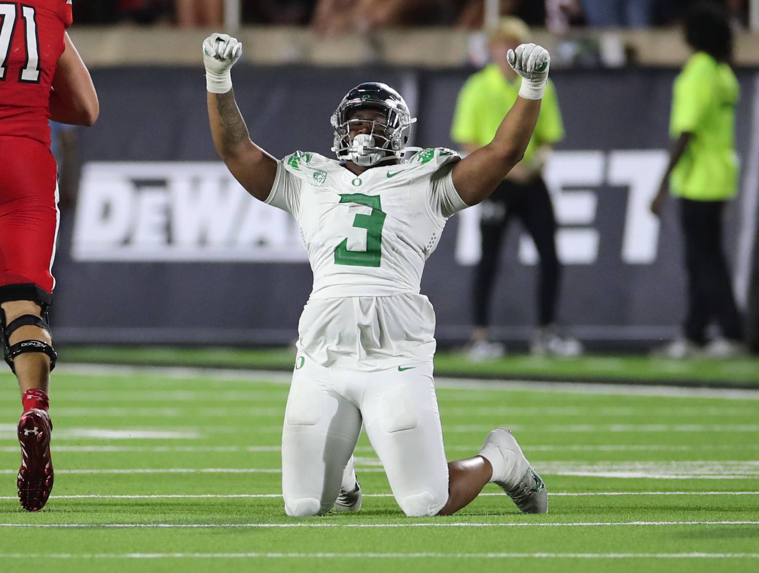 Sep 9, 2023; Lubbock, Texas, USA; Oregon Ducks defensive end Brandon Dorlus (3) reacts at the end of the game after an interception of the Texas Tech Red Raiders at Jones AT&T Stadium and Cody Campbell Field. Credit: Michael C. Johnson-USA TODAY Sports