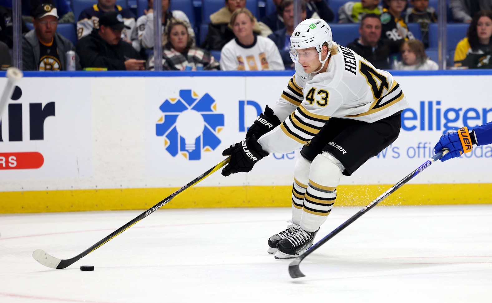 Sep 26, 2023; Buffalo, New York, USA; Boston Bruins left wing Danton Heinen (43) controls the puck during the third period against the Buffalo Sabres at KeyBank Center. Mandatory Credit: Timothy T. Ludwig-USA TODAY Sports