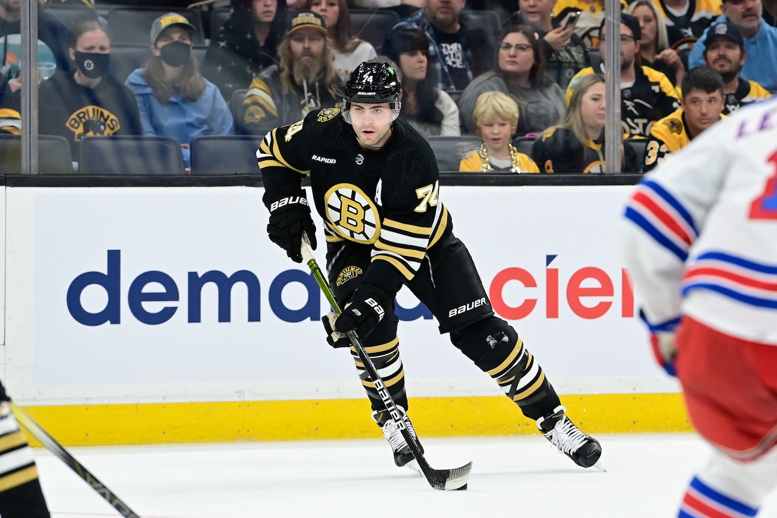 Sep 24, 2023; Boston, Massachusetts, USA; Boston Bruins left wing Jake DeBrusk (74) against the New York Rangers during the first period at TD Garden. Mandatory Credit: Eric Canha-USA TODAY Sports