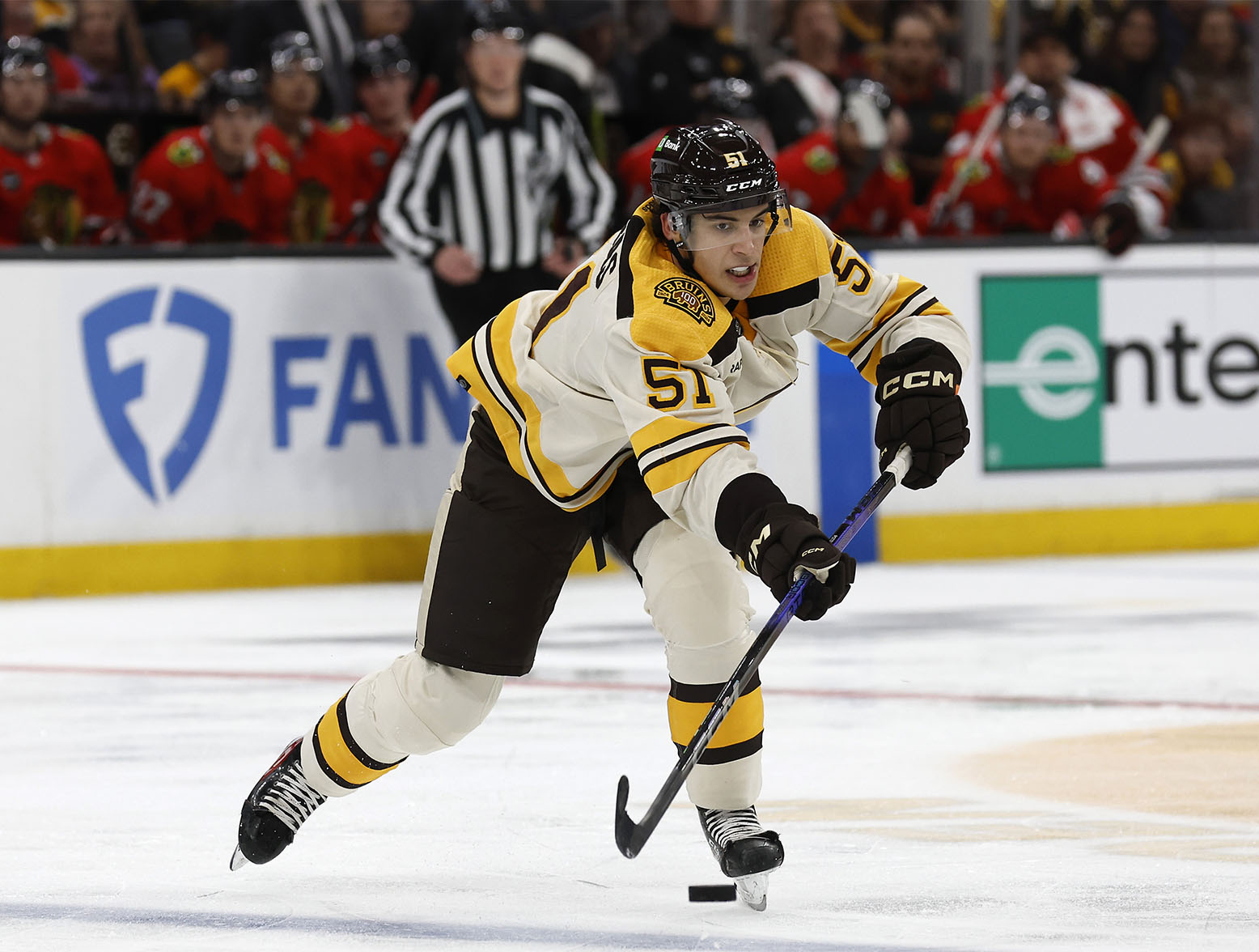 Oct 11, 2023; Boston, Massachusetts, USA; Boston Bruins center Matthew Poitras (51) makes a pass against the Chicago Blackhawks during the second period at TD Garden. Mandatory Credit: Winslow Townson-USA TODAY Sports
