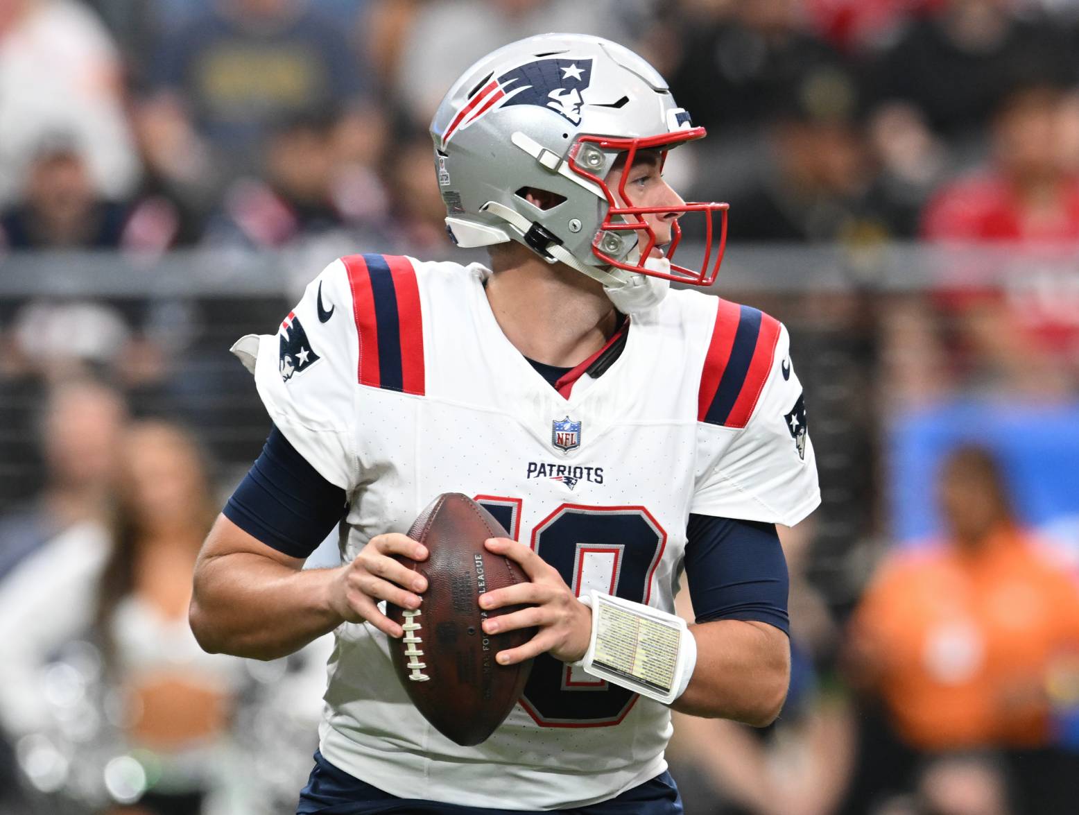 Oct 15, 2023; Paradise, Nevada, USA; New England Patriots quarterback Mac Jones (10) looks to make a pass in the first quarter against the Las Vegas Raiders at Allegiant Stadium. Credit: Candice Ward-USA TODAY Sports