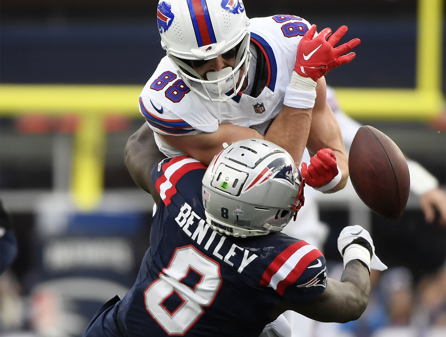 Oct 22, 2023; Foxborough, Massachusetts, USA; Buffalo Bills tight end Dawson Knox (88) drops the ball after getting hit by New England Patriots linebacker Ja'Whaun Bentley (8) during the second half at Gillette Stadium. Mandatory Credit: Bob DeChiara-USA TODAY Sports