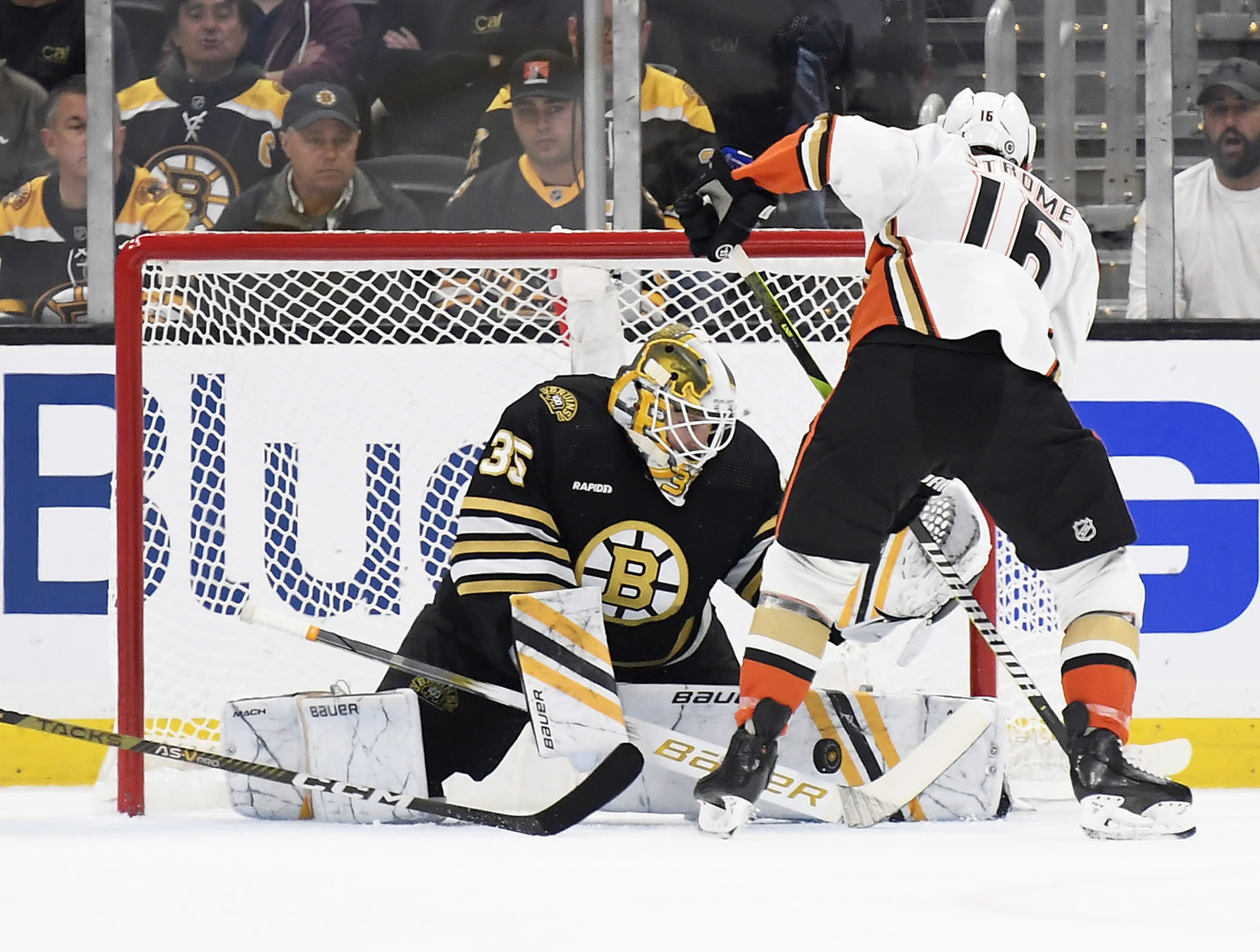 Oct 26, 2023; Boston, Massachusetts, USA; Boston Bruins goaltender Linus Ullmark (35) makes a save on Anaheim Ducks center Ryan Strome (16) during the first period at TD Garden. Mandatory Credit: Bob DeChiara-USA TODAY Sports