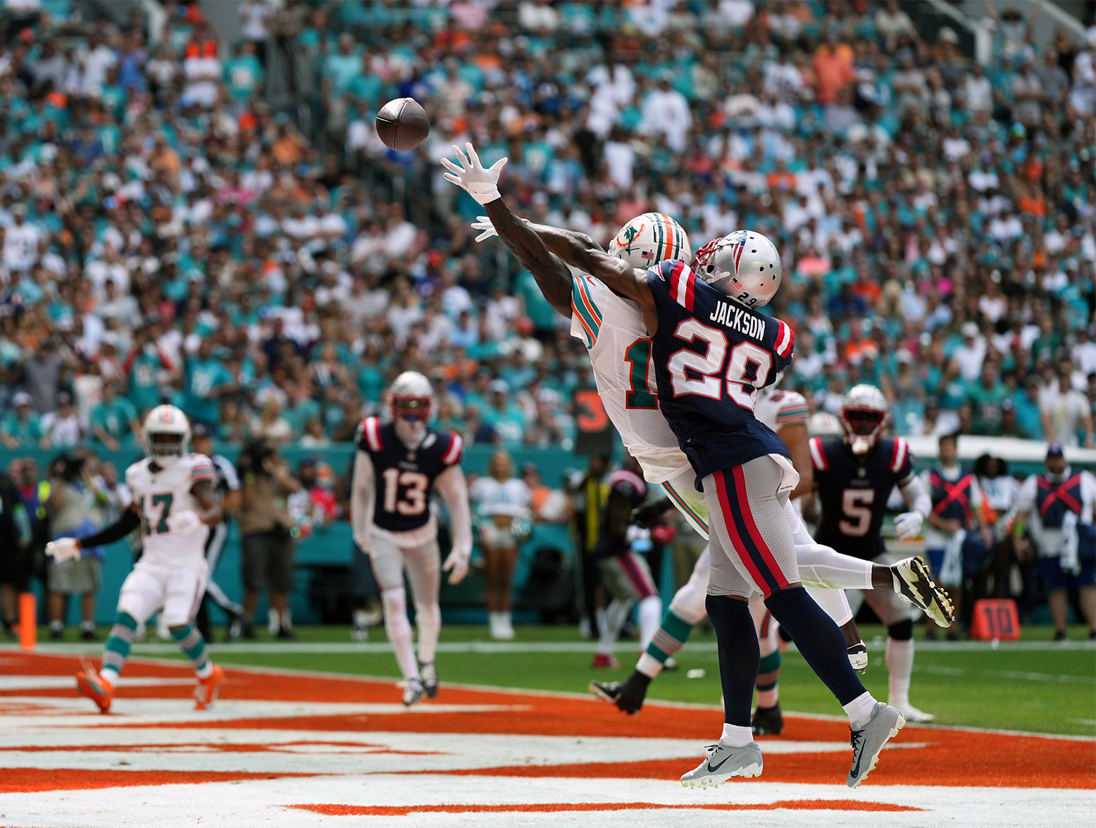 Oct 29, 2023; Miami Gardens, Florida, USA; New England Patriots cornerback J.C. Jackson (29) commits defensive pass interference on Miami Dolphins wide receiver Tyreek Hill (10) during the first half at Hard Rock Stadium. Mandatory Credit: Jasen Vinlove-USA TODAY Sports