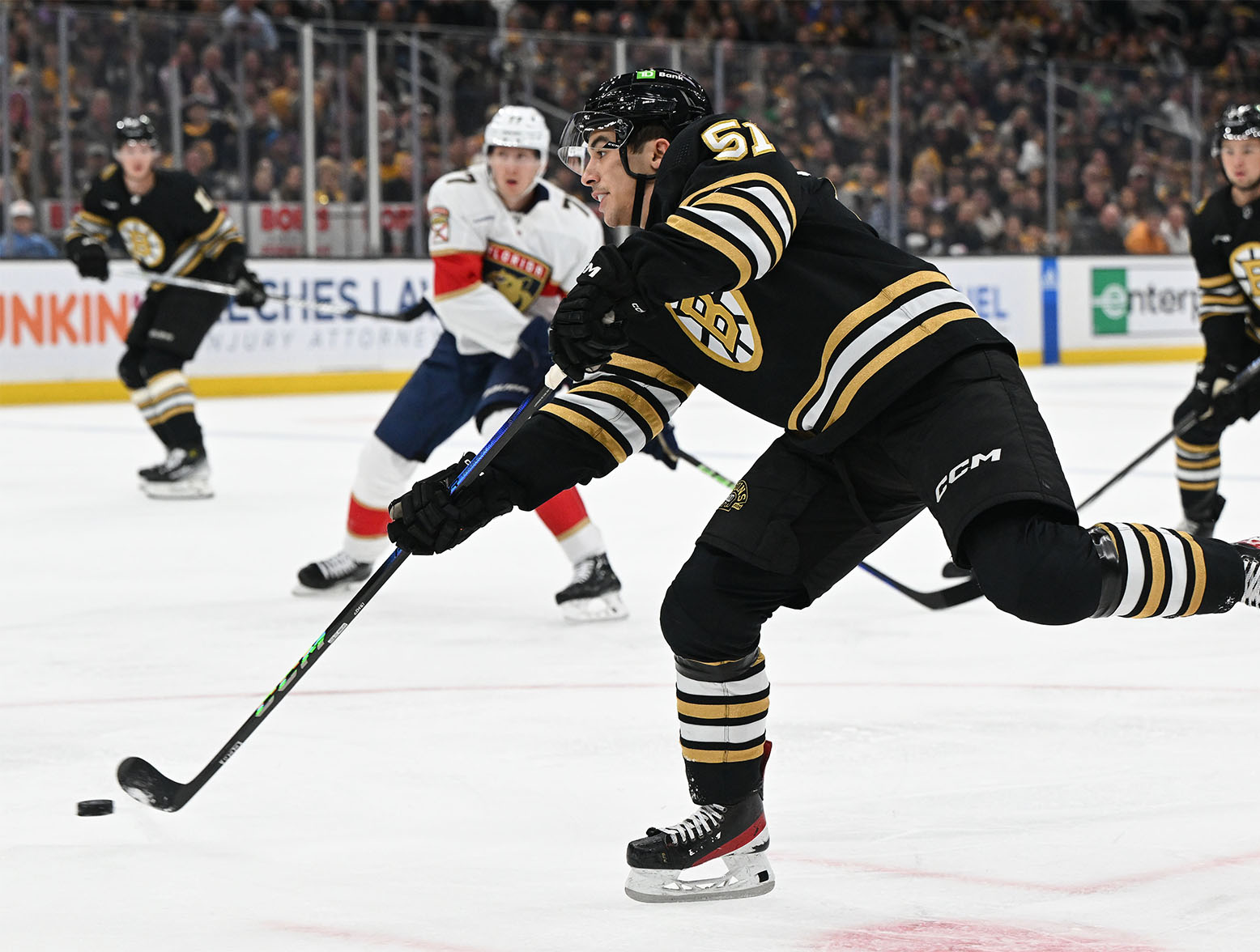 Oct 30, 2023; Boston, Massachusetts, USA; Boston Bruins center Matthew Poitras (51) takes a shot against the Florida Panthers during the first period at the TD Garden. Mandatory Credit: Brian Fluharty-USA TODAY Sports
