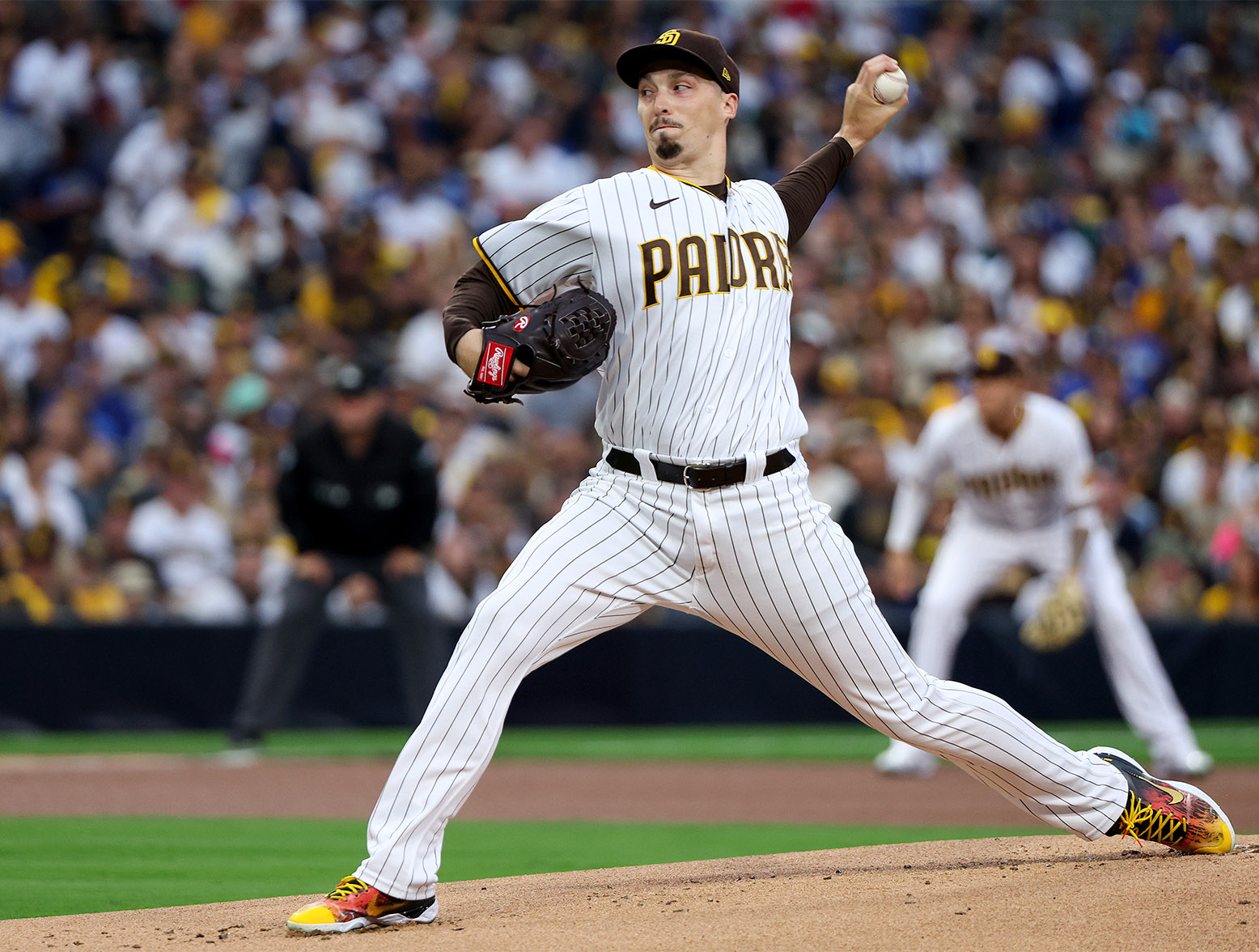 SAN DIEGO, CALIFORNIA - OCTOBER 14: Blake Snell #4 of the San Diego Padres delivers a pitch against the Los Angeles Dodgers during the first inning in game three of the National League Division Series at PETCO Park on October 14, 2022 in San Diego, California. (Photo by Harry How/Getty Images)