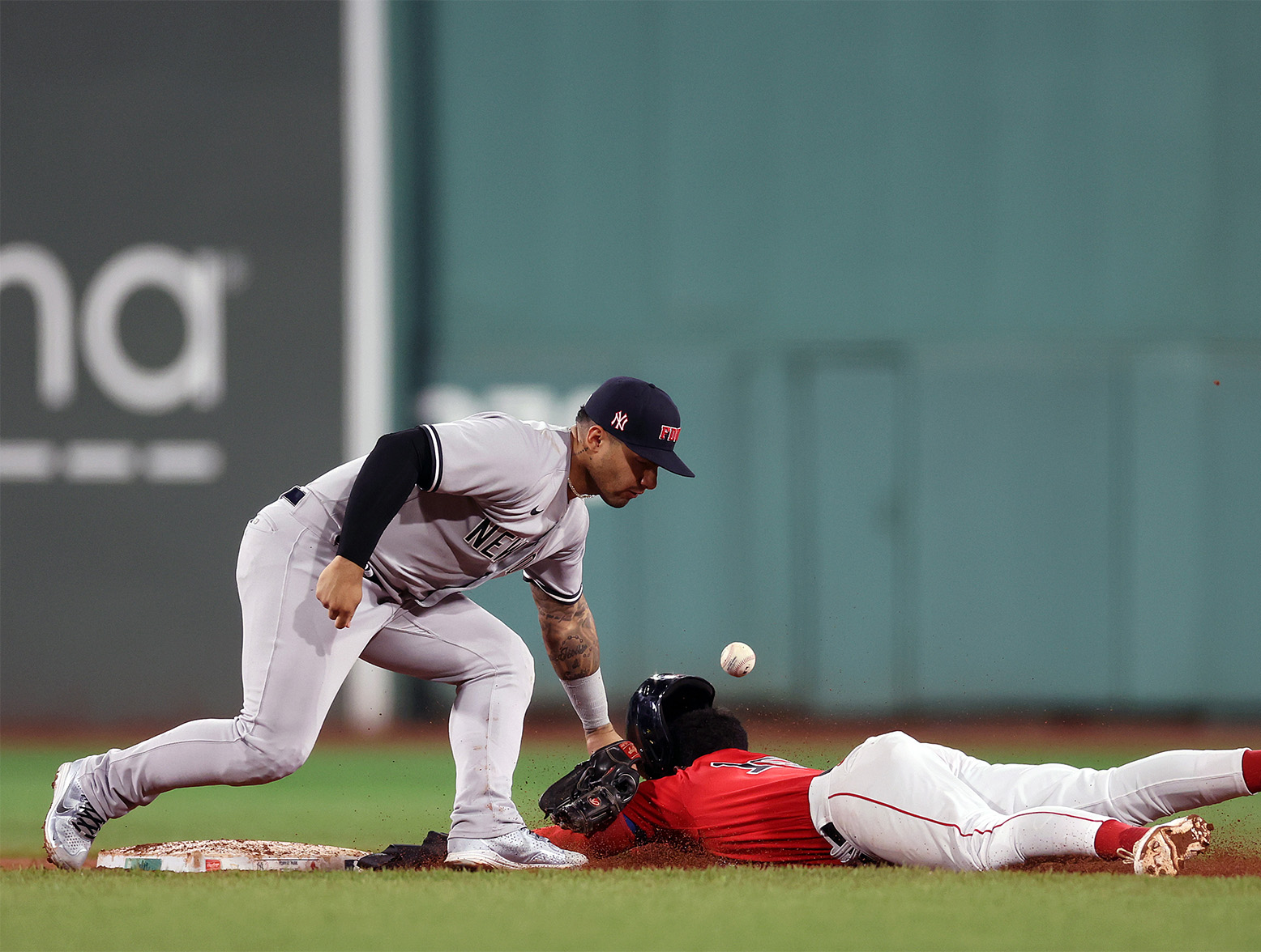 BOSTON, MASSACHUSETTS - SEPTEMBER 12: Pablo Reyes #19 of the Boston Red Sox slides safe into second base past Gleyber Torres #25 of the New York Yankees during the sixth inning at Fenway Park on September 12, 2023 in Boston, Massachusetts. (Photo by Maddie Meyer/Getty Images)